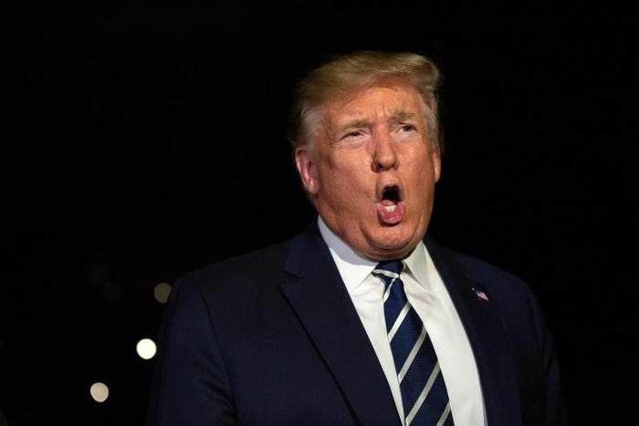 US President Donald Trump speaks to the press as he departs the White House for the G7 Summit in France