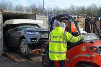 File image of a Range Rover concealed under mattresses is pulled out of a cargo container meant to be transported to Kenya (Standard)