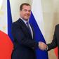 A spokesman for Philippine leader Rodrigo Duterte (right) defended his dishevelled appearance at a meeting with Russian Prime Minister Dmitry Medvedev (left) in Moscow