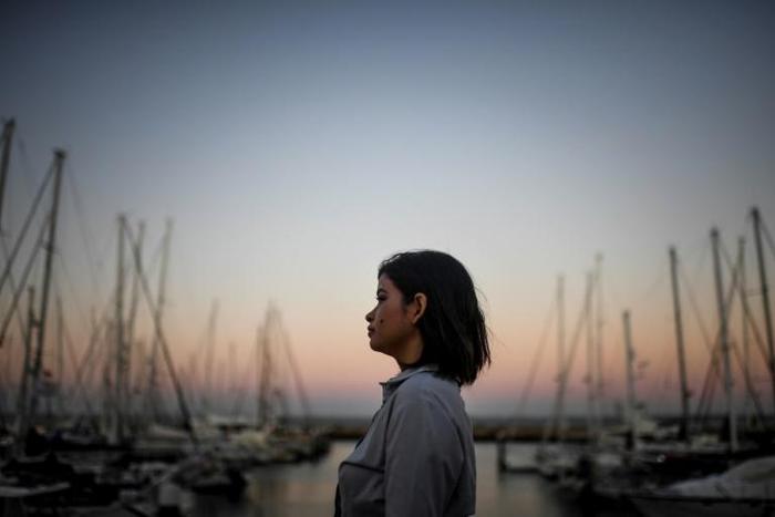 Brazilian Meg Macedo, a 33-year-old lesbian, says she came to Lisbon to study theatre, describing Portugal as "open and progressive"