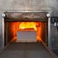 A coffin being cremated