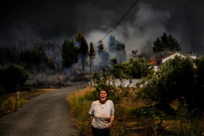 Around 30 people have been injured in the blaze which broke out on Saturday amid scorching temperatures
