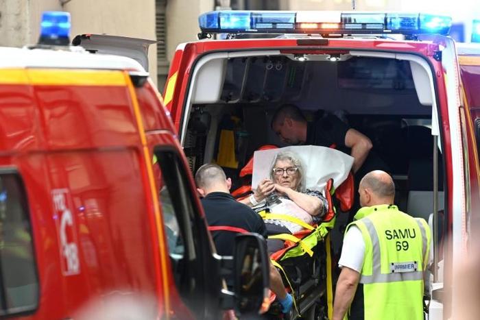 Officials say 13 people were slightly wounded by a charge that the district mayor said "was too small to kill"