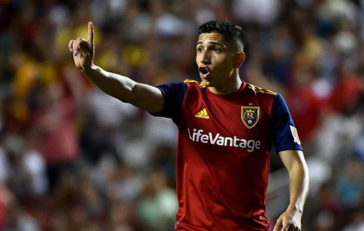 Argentine striker Jefferson Savarino scored the winning goal for Real Salt Lake in a 2-1 Major League Soccer victory Sunday over Houston that clinched a playoff berth for the Utah club