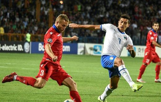 Italy midfielder Lorenzo Pellegrini (R) scored his first goal for the Azzurri against Armenia in September.