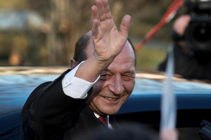 OFormer president Traian Basescu, seen at a 2014 inauguration ceremony for his successor Klaus Iohannis, said he would appeal against the court finding that he collaborated with Communist-era secret police