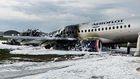 Why do you grab your bag when running off a burning plane