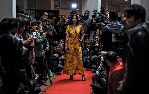 A model shows off a kimono during a fashion show by former FARC combatants in Bogota