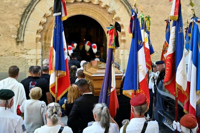 Hundreds gathered Friday in Signes, southern France, for the funeral of mayor Jean-Mathieu Michel, who was killed after stopping two construction workers from illegaly dumping rubble