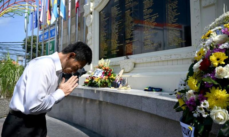 An official from the Japanese consulate was among diplomatic representatives and grieving families who paid respects and laid flowers at a memorial for victims of the 2002 Bali bombings, on the 17th anniversary of the attacks