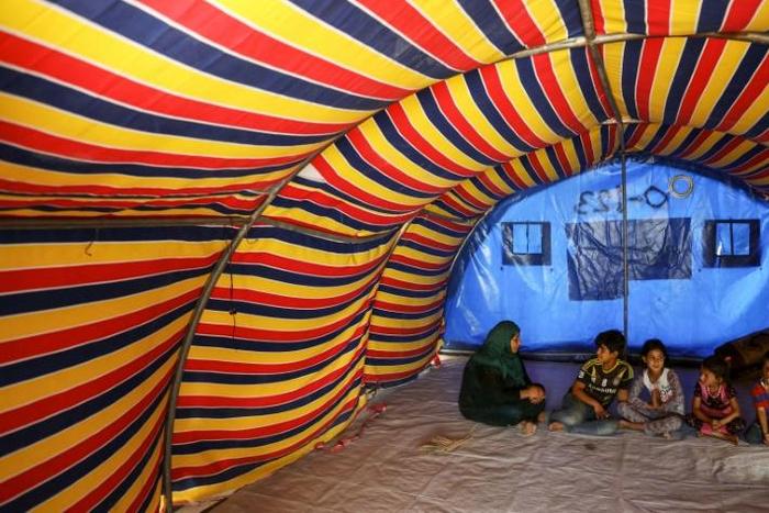 Nihaya Issa, 33, and her family live in Iraq's sprawling Khazer refugee camp