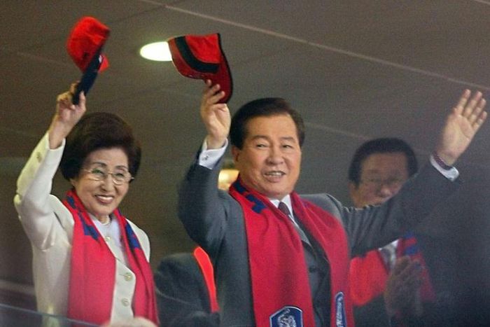Lee Hee-ho and her late husband Kim Dae-jung wave during the 2002 World Cup in Seoul
