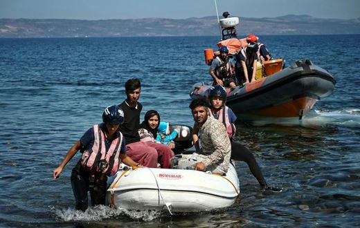 Migrants helped by rescuers arrive on the Greek island of Lesbos after crossing the Aegean Sea from Turkey, on September 16, 2019