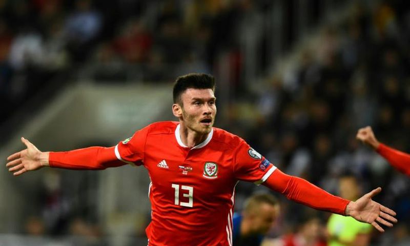 Wales striker Kiefer Moore celebrates scoring the opening goal