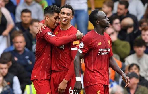 Roberto Firmino (left) and Trent Alexander-Arnold (centre) scored in Liverpool's 2-1 win at Chelsea