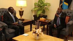 Tanzanian President John Magufuli (right) during talks with Health CS Cleopa Mailu in Tanzania.