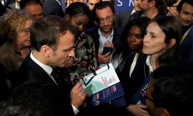 French President Emmanuel Macron, left, at the Vivatech technology fair in Paris on Thursday.