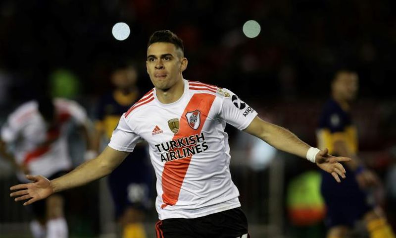 River Plate's Colombian Rafael Santos Borre celebrates after scoring a penalty against Boca Juniors during their all-Argentine Copa Libertadores semi-final first leg football match at the Monumental stadium in Buenos Aires, on October 1, 2019.