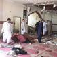 Security officials examined the site of a blast at a mosque in the town of Kuchlak that killed the Afghan Taliban leader's brother in southwest Quetta on August 16, 2019