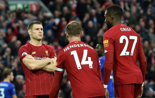 Calm head: James Milner's stoppage time penalty to beat Leicester gave Liverpool an eight-point Premier League lead