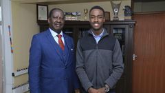 Opposition leader Raila Odinga with David Mokenye Onyuoki, political science students at Duke University who will be his intern