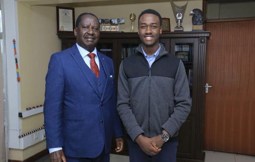 Opposition leader Raila Odinga with David Mokenye Onyuoki, political science students at Duke University who will be his intern