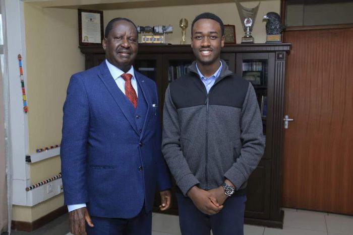 Opposition leader Raila Odinga with David Mokenye Onyuoki, political science students at Duke University who will be his intern