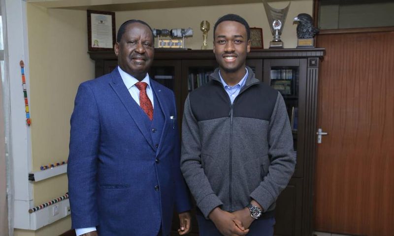 Opposition leader Raila Odinga with David Mokenye Onyuoki, political science students at Duke University who will be his intern