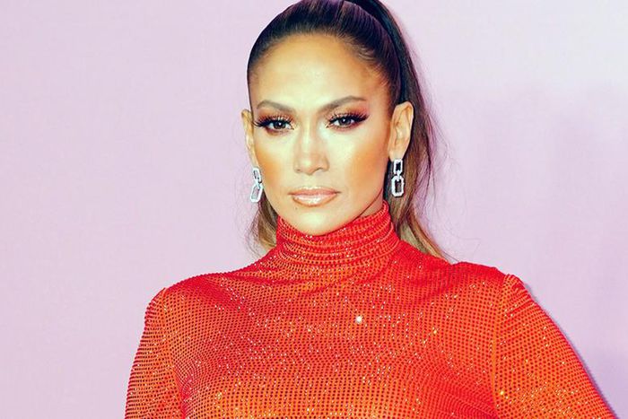 J.Lo Shows Off Toned Abs And Back In New Photos