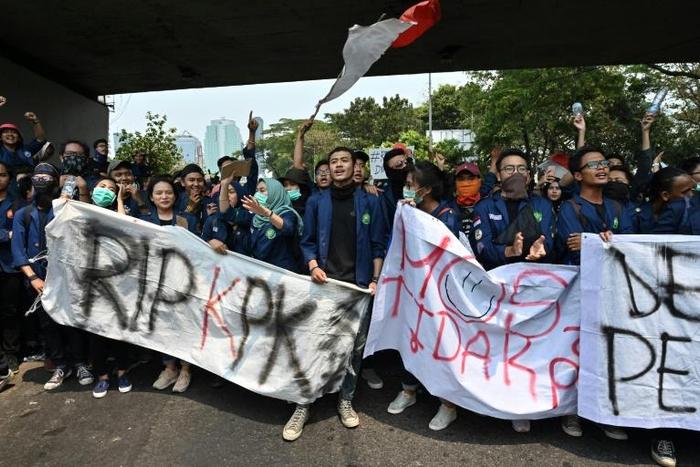 Protestors in Jakarta rally against the proposed changes which could affect millions, including gay and heterosexual couples who might face jail for having sex outside wedlock, or having an affair