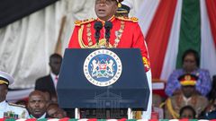 Uhuru dons a red Commander-in-Chief’s ceremonial military uniform (Courtesy)