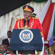 Uhuru dons a red Commander-in-Chief’s ceremonial military uniform (Courtesy)