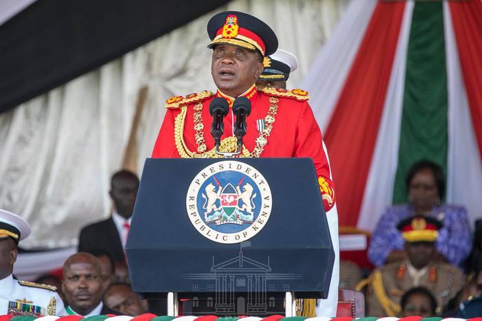 Uhuru dons a red Commander-in-Chief’s ceremonial military uniform (Courtesy)