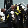 Divers helping in retrieval of bodies at Likoni Channel