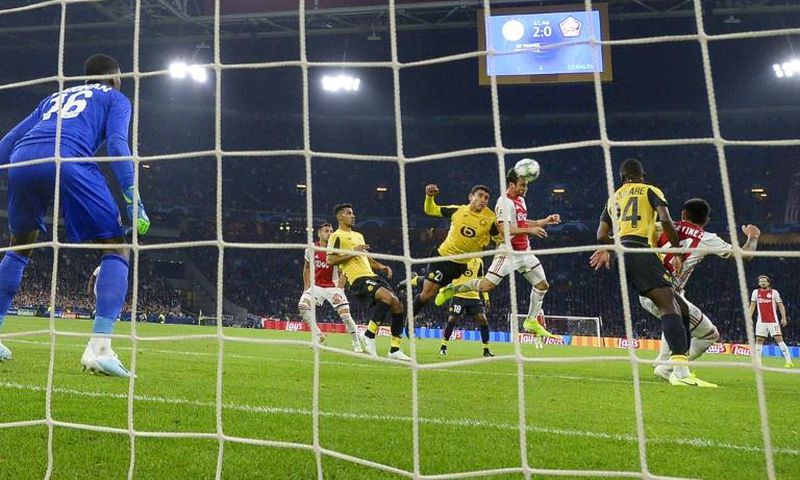 Nicolas Tagliafico crashed home the third as Ajax cruised past Lille in their Champions League opener