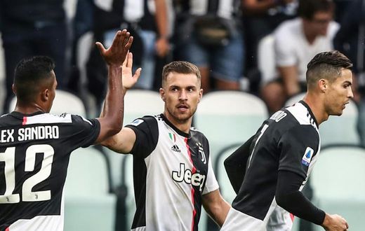 Welsh midfielder Aaron Ramsey (C) scored on his first start for Juventus.