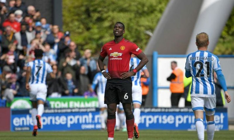 Stunned: Manchester United cannot now qualify for next season's Champions League after a 1-1 draw at relegated Huddersfield