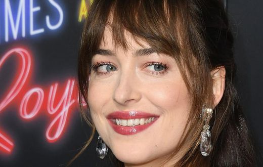 Dakota Johnson's Tooth Gap Is Gone?!