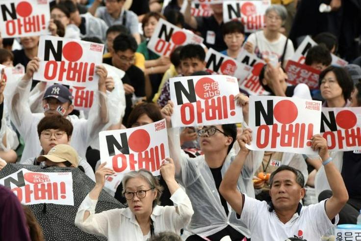 Seoul's decision to end the military intel-sharing pact is the latest in a series of tit-for-tat measures triggered by a run of South Korean court rulings against Japanese firms, requiring them to pay for forced labour during World War II