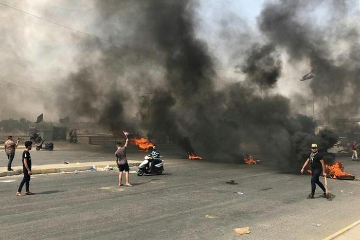 Protests erupt in Baghdad for a second straight day prompting security forces to fire live rounds in the air despite calls for restraint from President Barham Saleh