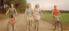 Riding bike gif (Tenor)