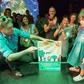 Austrian Green party head Werner Kogler holds a placard reading 'We only borrowed the earth from our children' after the exit poll results came in on Sunday