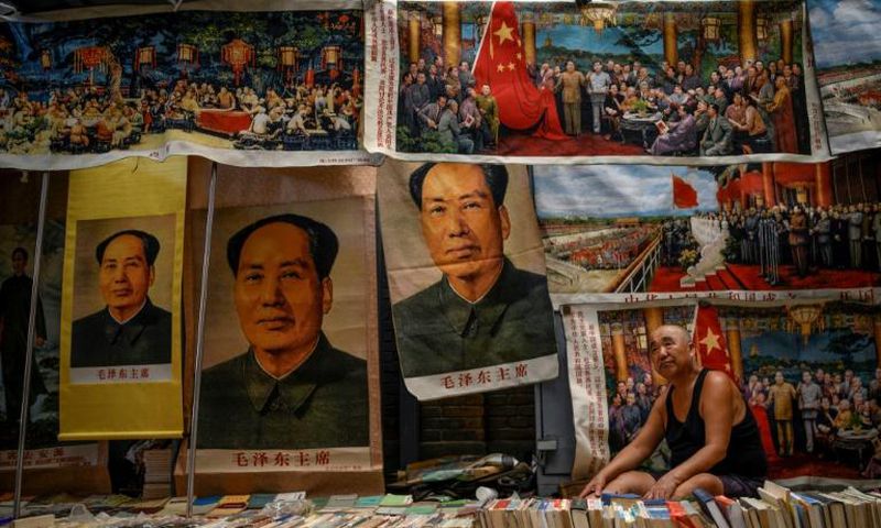 Beijing's Panjiayuan antique market is fit to bursting with Mao memorabilia