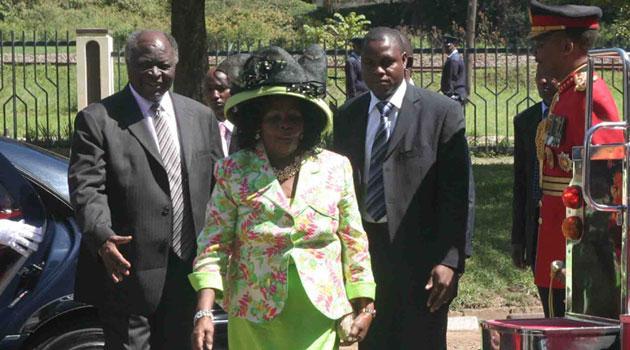 Kenya's former President Mwai Kibaki (left) and First Lady Lucy Kibaki