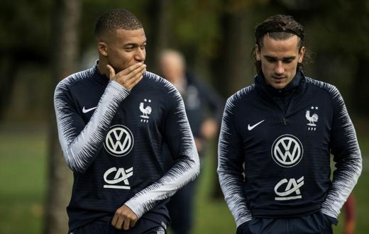 Kylian Mbappe (left) and Antoine Griezmann in training with France at Clairefontaine-en-Yvelines on Monday.
