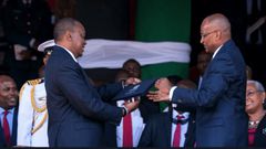 CBK Governor Patrick Njoroge presents the new generation notes to President Uhuru Kenyatta on 01 June 2019  during the Madaraka Day celebrations in Narok