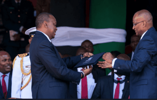 CBK Governor Patrick Njoroge presents the new generation notes to President Uhuru Kenyatta on 01 June 2019  during the Madaraka Day celebrations in Narok