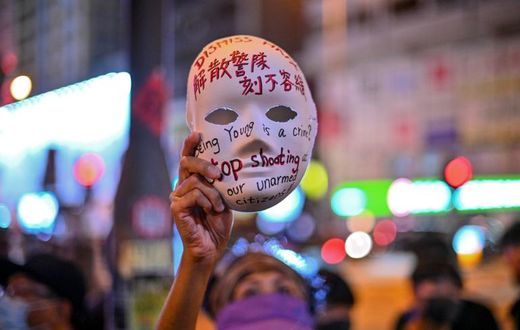 Hong Kong's leader outlawed face coverings at protests, invoking colonial-era emergency powers not used for half a century
