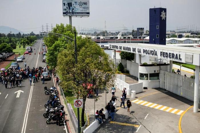Members of the Federal Police protest against what they call forced transfers to the newly created National Guard, outside the Federal Police headquarters in Mexico City on July 4, 2019