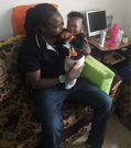 Baby Ethan Muendo with his father, KBC journalist Jonathan Muendo (Twitter)